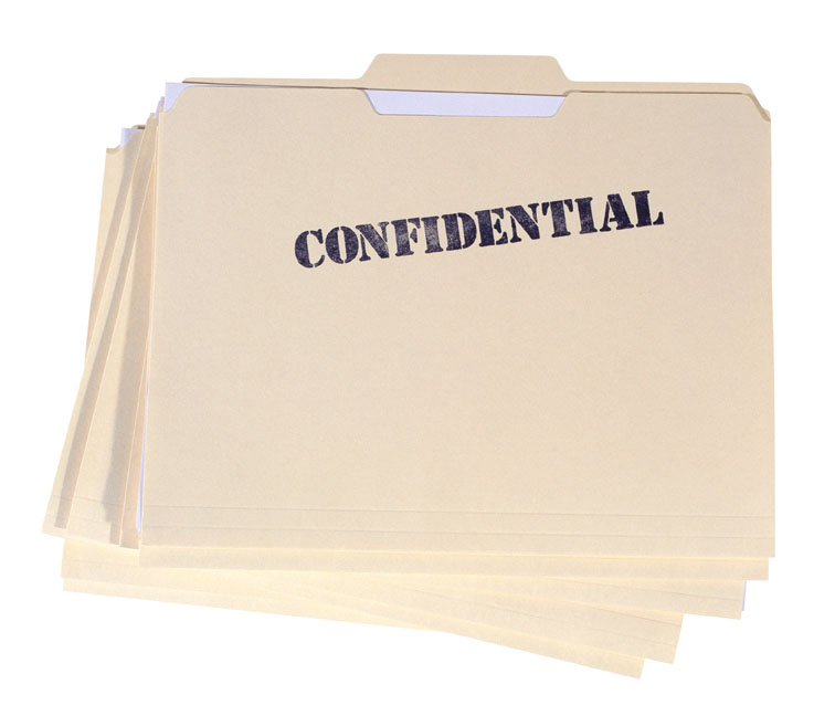 a stack of several file folders. The folder at the top of the stack has the word confidential stamped on it.